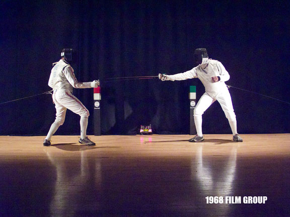 Image of two men fencing.